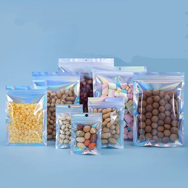 ODM Holographic Clear Transparent Front Window Three Sides Seal Plastic Pouch Dried Fruit Food Package Soft Candy Dried Fruits Nuts Jewelry Zipper Packaging Bag